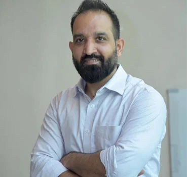 Suresh Sharma, Chief Operating Officer